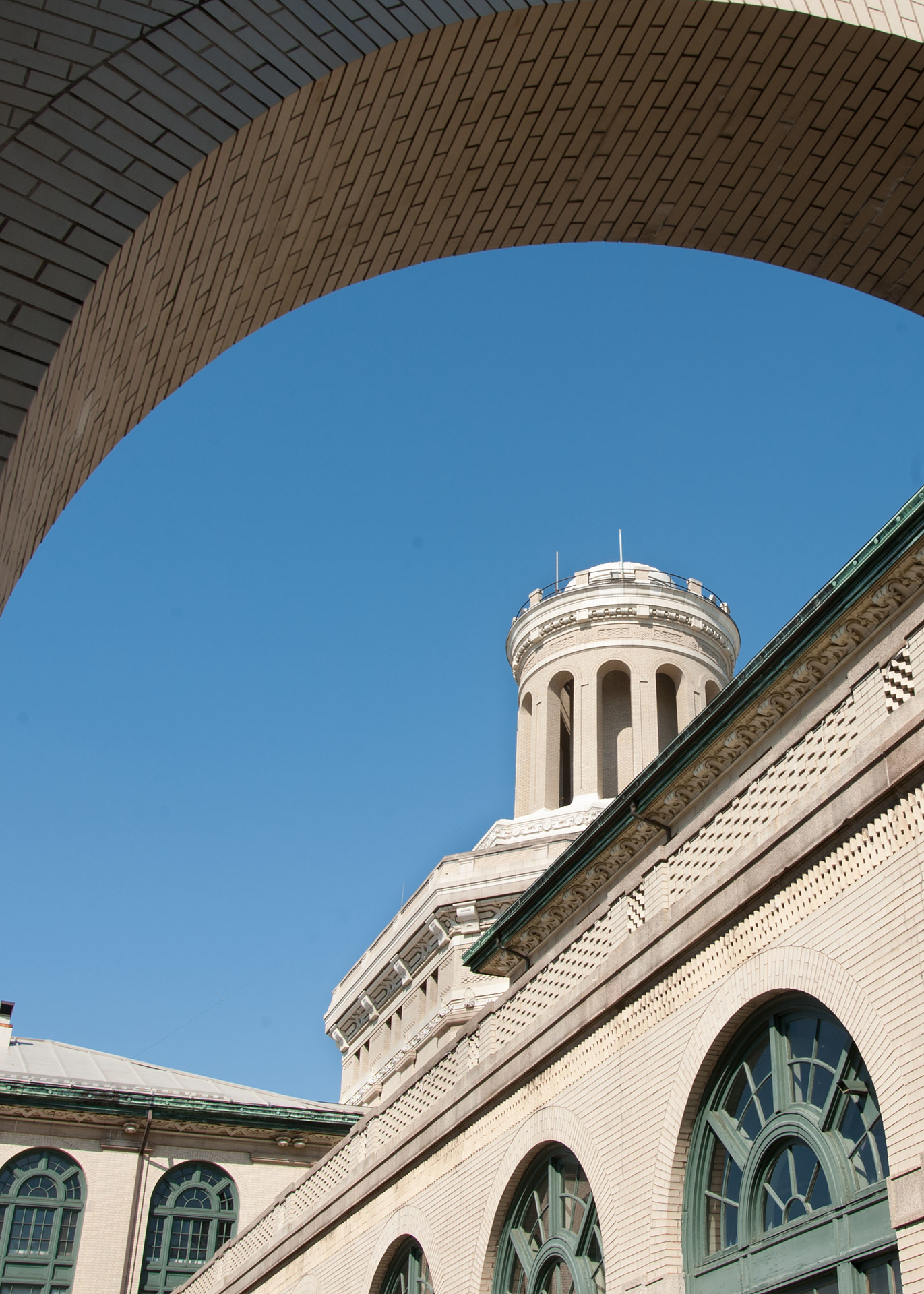 View of Hamerschlag Hall through a brick archway