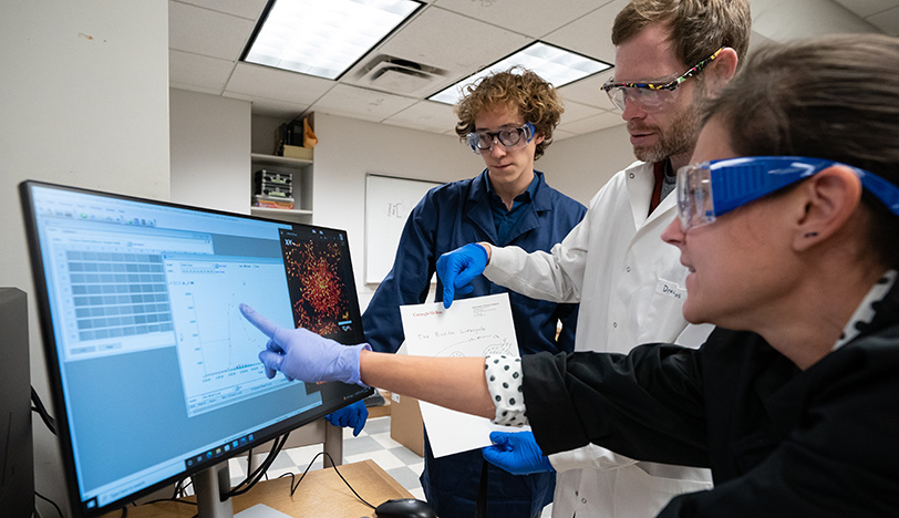 Students demonstrate how to use robotic biological science equipment to study bacteria during the Drew Bridges lab at the Mellon College of Science in the Mellon Institute on Monday November 7, 2022.