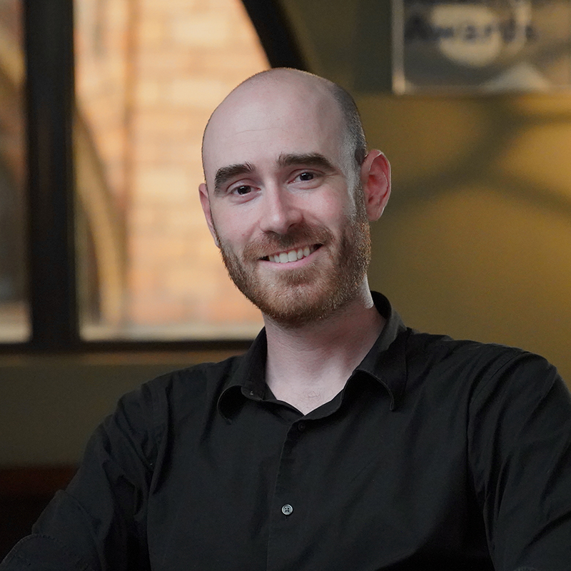 Nick Ryan sitting in a chair